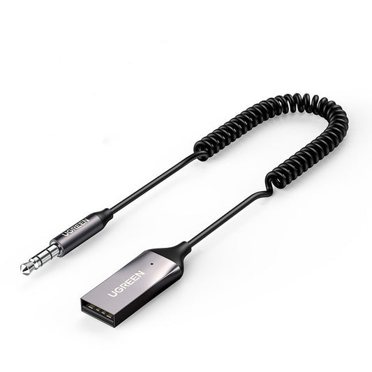 UGREEN Bluetooth Aux Adapter with a coiled cable and a 3.5mm jack connector on one end and a USB connector on the other.